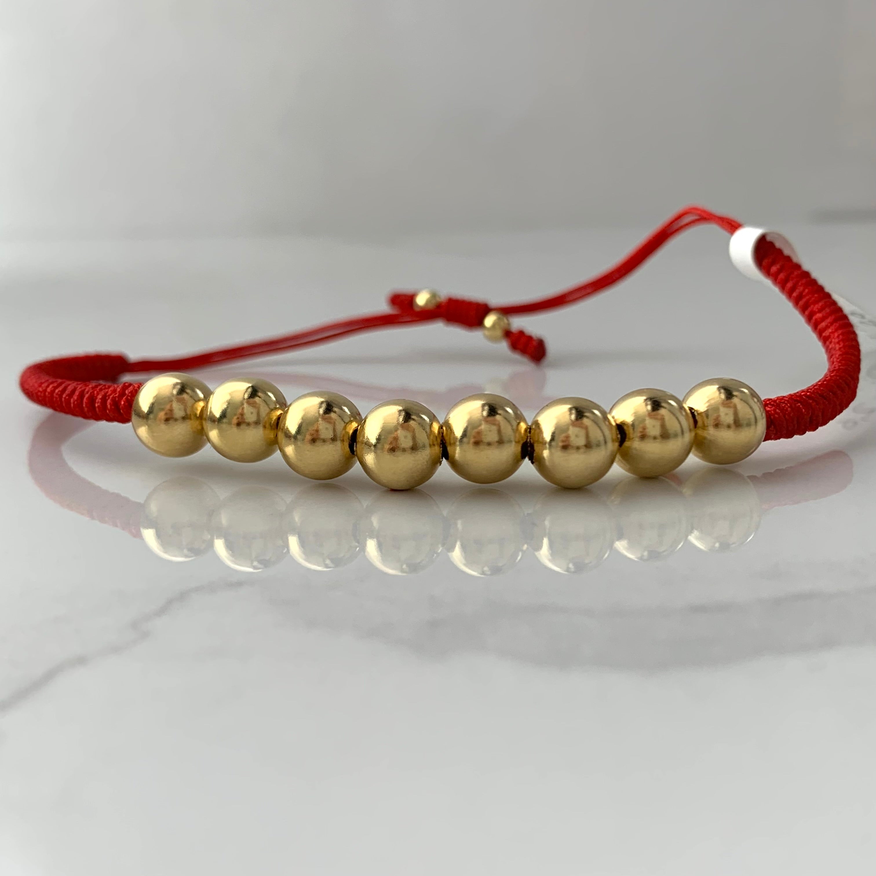 PULSERA TEJIDA ROJA BOLA LISA 8MM 4MM  ORO AMARILLO 18K 2,6 GR BROCHE