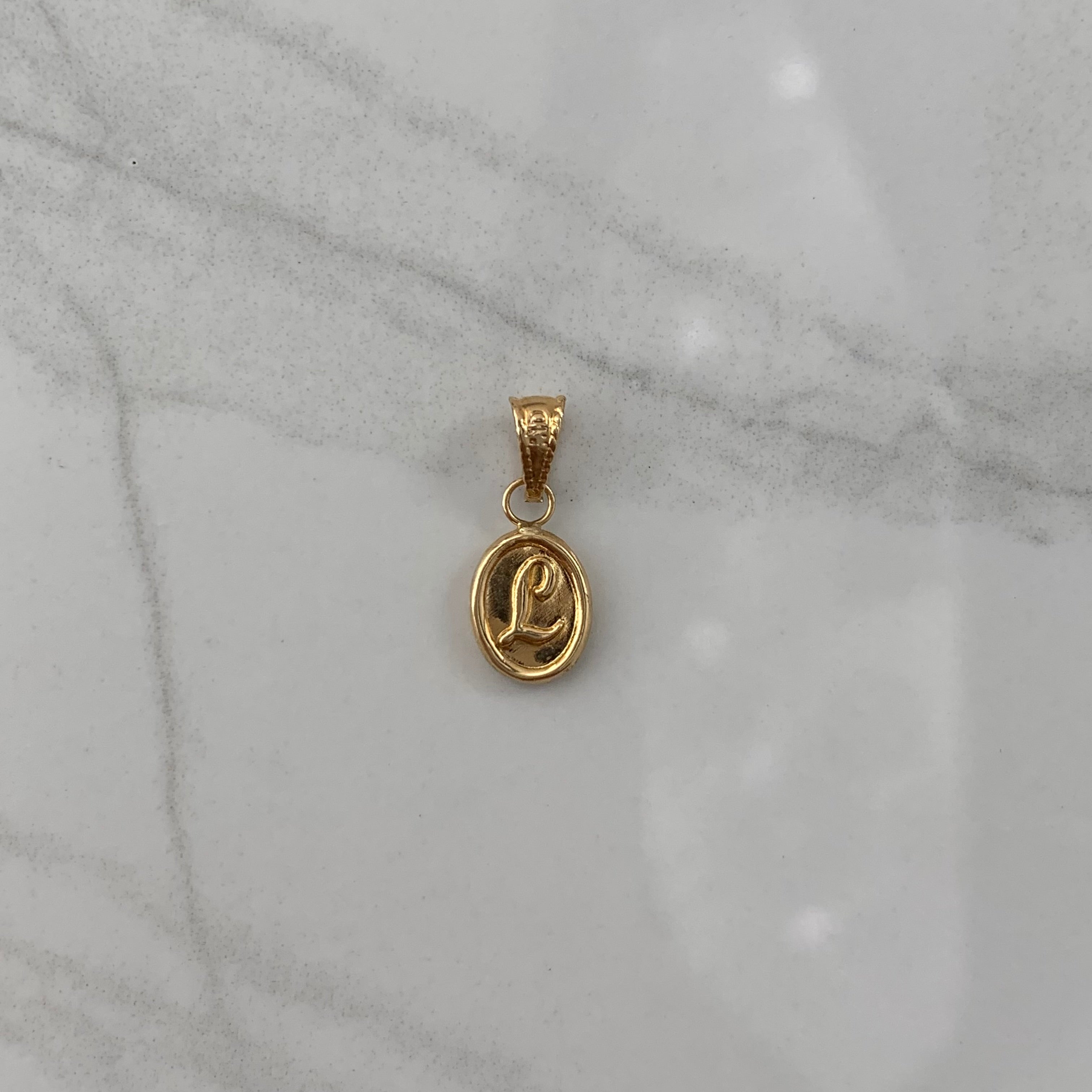 DIJE LETRA N ORO AMARILLO 18K 0,41 GR / 0,7 MM / 1,2 CM