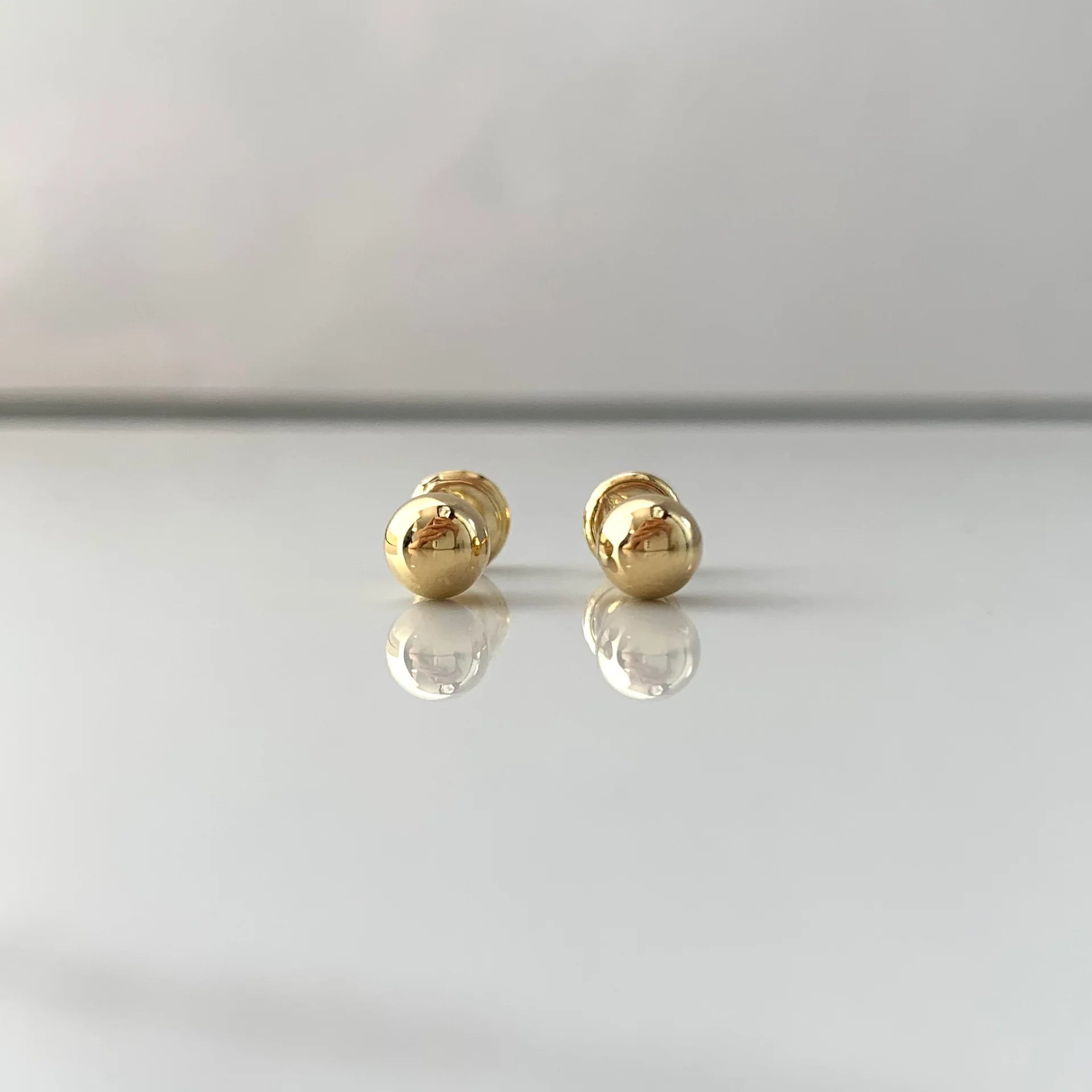 TOPOS BOLA LISA  ORO AMARILLO 18K 0,65 GR / 5 MM  BROCHE